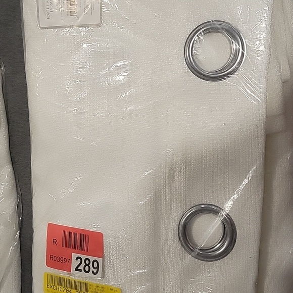 New Indoor/outdoor curtains. 2 panels 54x108 ea. Aztec white color - Picture 6 of 7